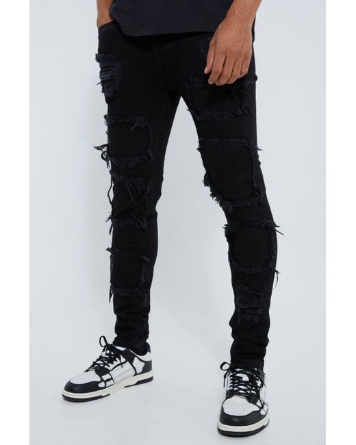 BoohooMAN Black Skinny Stacked Distressed Ripped Jeans for men