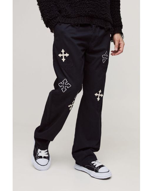 BoohooMAN Tall lockere Hose mit Kreuz-Applikation in Black für Herren