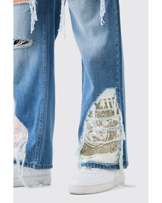 BoohooMAN Tall Relaxed Rigid Flare Rip & Repair Applique Jeans in Blue für Herren