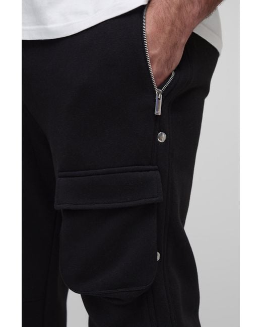 BoohooMAN Black Plus Slim Stacked Flared Popper Detail Joggers for men