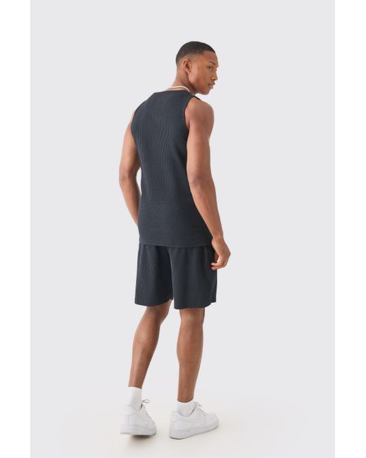 BoohooMAN Blue Muscle Fit Textured Tank With Woven Tab for men