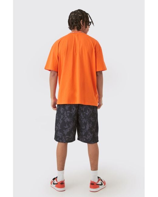 BoohooMAN Orange Oversized Extended Neck Limited Edition T-shirt & Basketball Set for men
