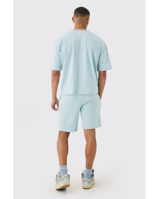 BoohooMAN Blue Loose Fit Graffiti Printed Jersey Shorts for men