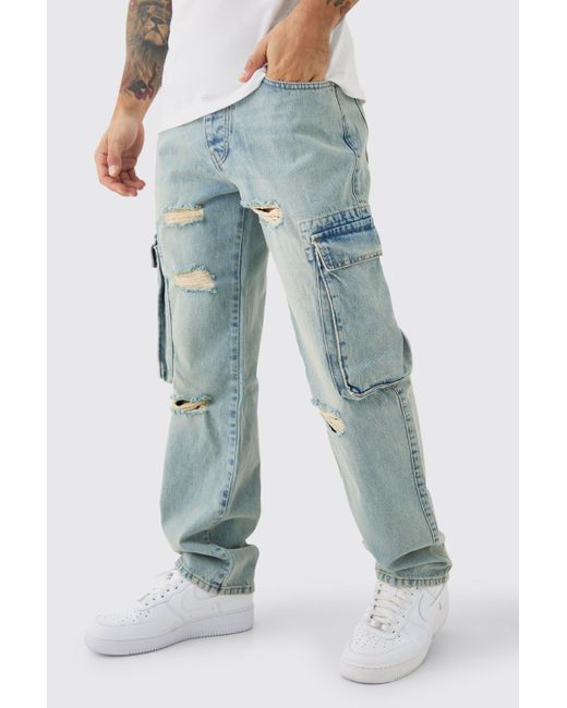 BoohooMAN Relaxed Rigid Ripped Cargo Pocked Denim Jean In Light Blue for men