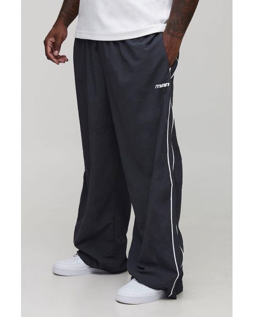 BoohooMAN Black Plus Stripe Embroidered Parachute Pants for men