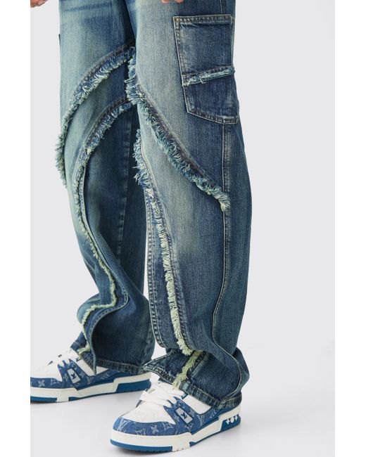 BoohooMAN Baggy Distressed Panelled Cargo Jeans In Mid Blue for men