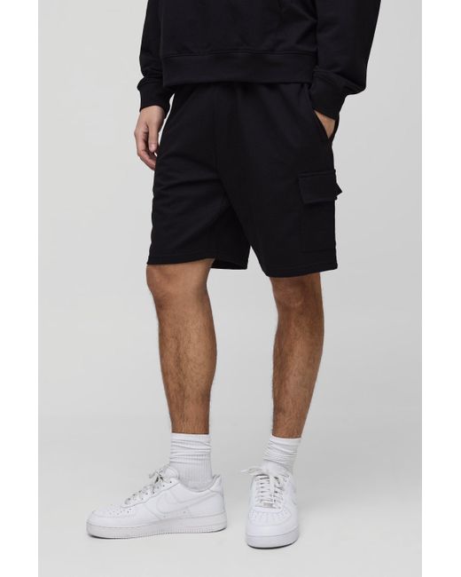 BoohooMAN Lockere mittellange Cargo-Shorts in Black für Herren