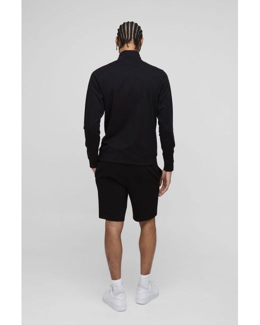 BoohooMAN Black Lightweight Basic Slim Fit Mid Length Shorts for men