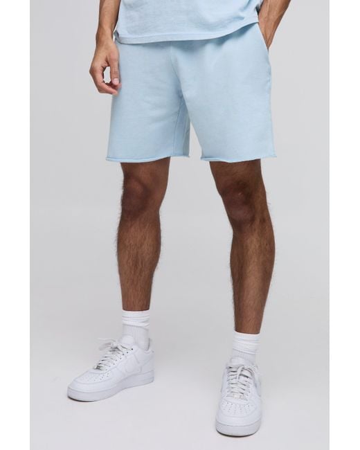 BoohooMAN Blue Relaxed Mid Length Raw Hem Washed Loopback Shorts for men