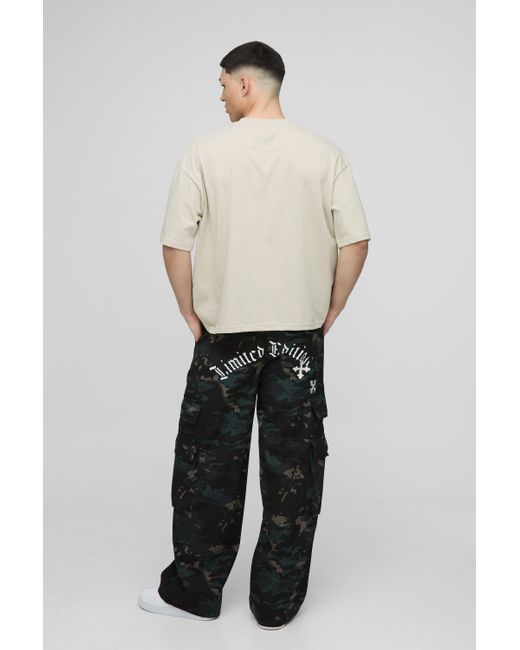 BoohooMAN Black Baggy Washed Cross Applique Camo Cargo Pants for men