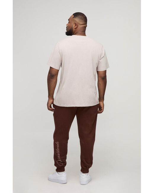 BoohooMAN Brown Plus Regular Fit Cherub Worldwide Print Jogger for men