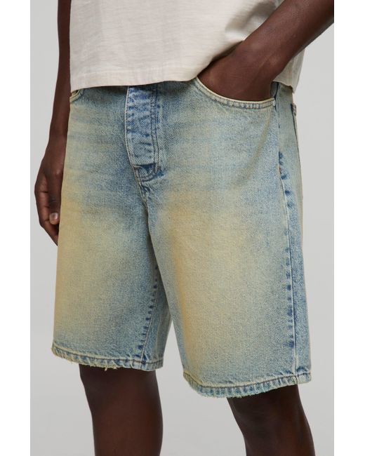 Pantalón Corto Vaquero Holgado Con Lavado A La Piedra Y Bajo Sin Acabar Boohoo de color Blue