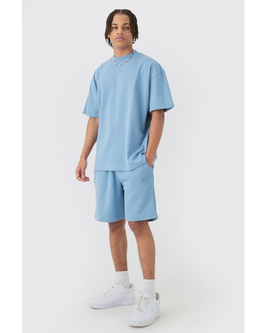 BoohooMAN Blue Oversized Extended Neck Official Embossed T-shirt & Short Set for men