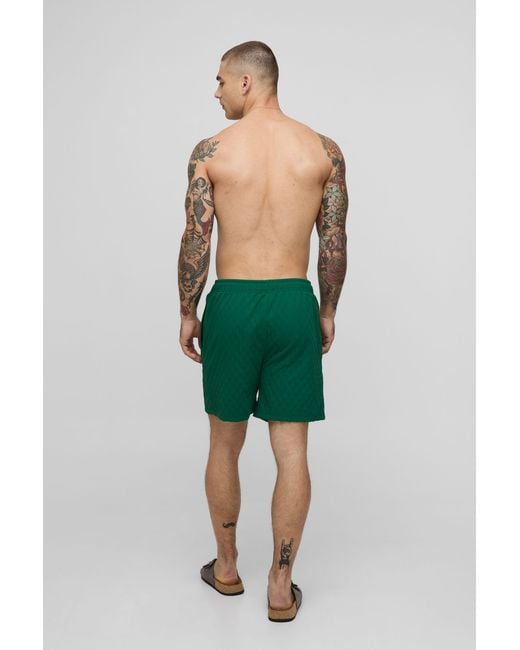 BoohooMAN Green Mid Length Textured Swim Trunks for men
