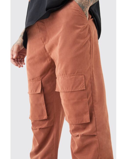 BoohooMAN Black Tall Fixed Waist Relaxed Peach Flare Cargo Pants for men