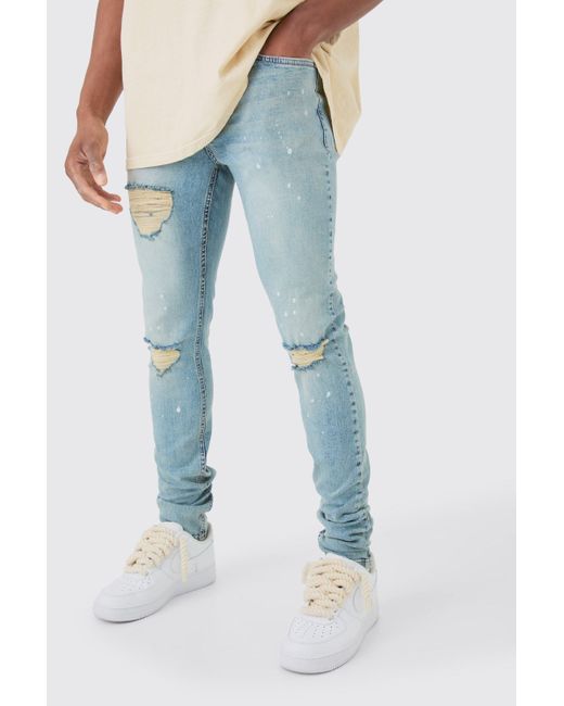 Boohoo Skinny Stretch Stacked Ripped Paint Splatter Jeans In Ice Blue