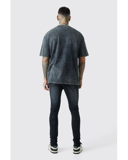 BoohooMAN Black Tall Super Skinny Distressed Paint Splat Jeans for men