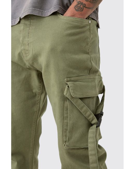 BoohooMAN Tall Fixed Waist Slim Stacked Flare Strap Cargo Trouser in Green für Herren