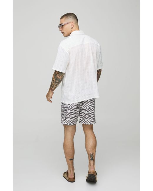 BoohooMAN Brown Pattern Printed Mid Length Swim Trunks for men