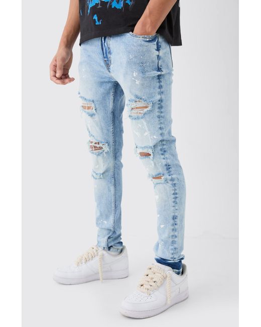 BoohooMAN Blue Skinny Stretch Paint Splatter Ripped Jeans for men