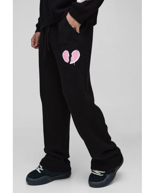 BoohooMAN Black Regular Fit Printed Broken Heart Graphic Knitted Sweatpants for men