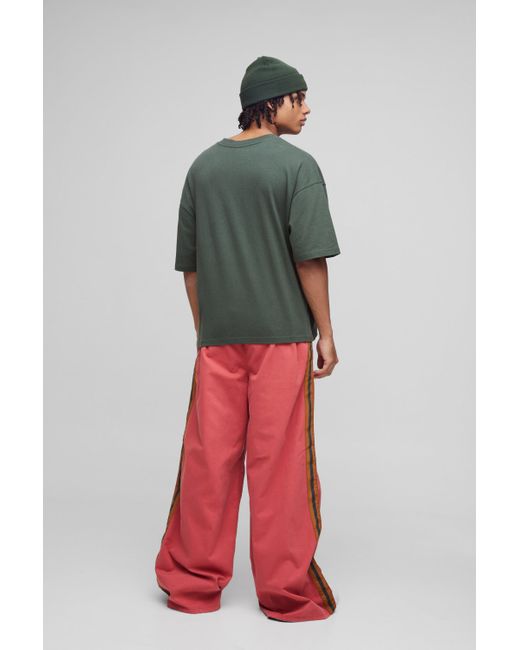 BoohooMAN Extrem lockere Twill-Hose mit elastischem Bund in Red für Herren