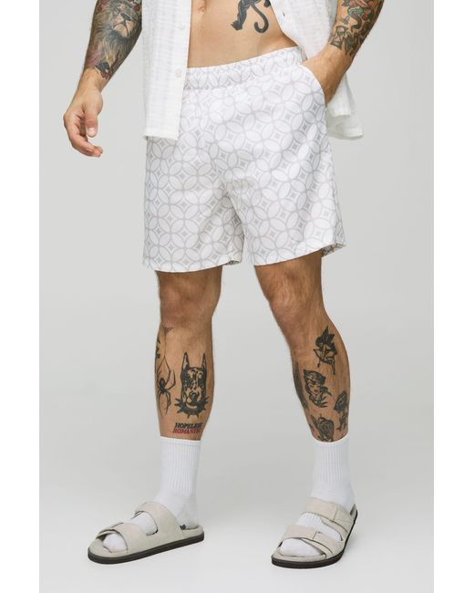 BoohooMAN White Abstract Pattern Mid Length Swim Trunks for men