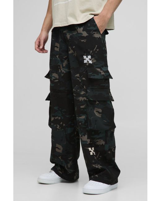 BoohooMAN Black Baggy Washed Cross Applique Camo Cargo Pants for men