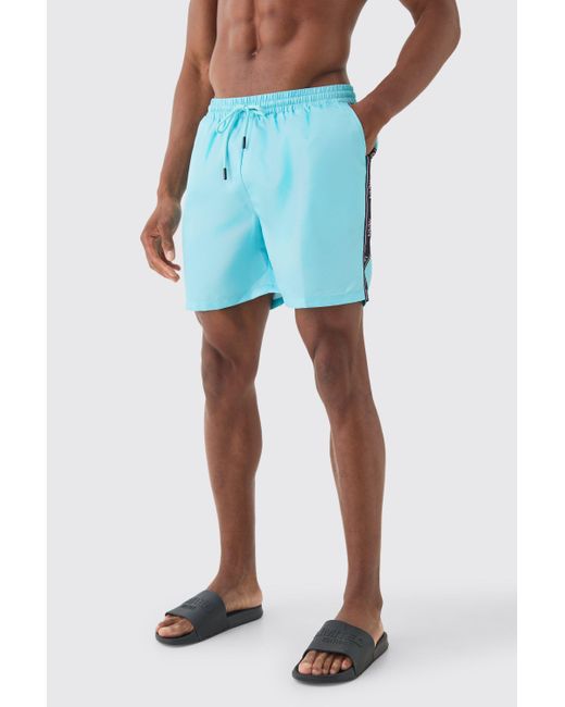 BoohooMAN Blue Mid Length Man Tape Swim Shorts for men