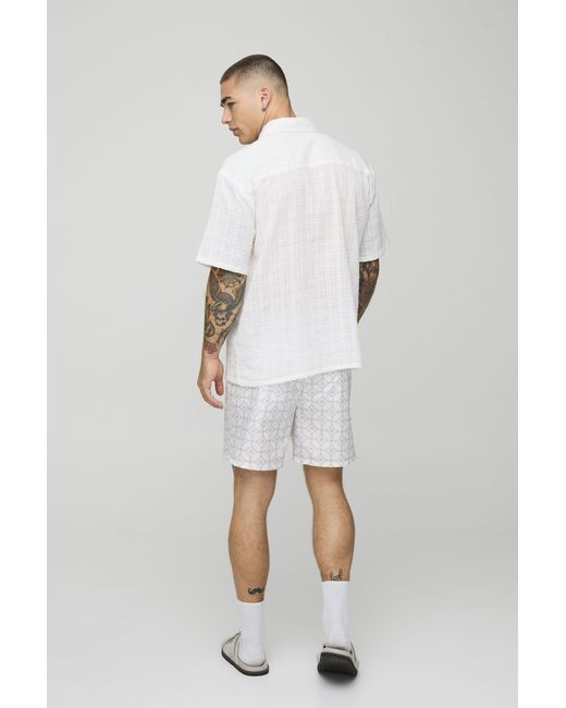 BoohooMAN White Abstract Pattern Mid Length Swim Trunks for men