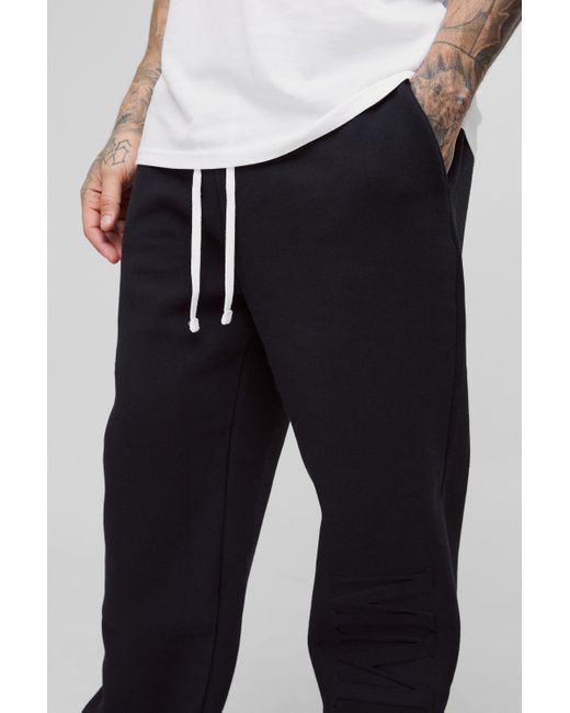 BoohooMAN Black Tall Oversized Mmxiii Embossed Jogger for men