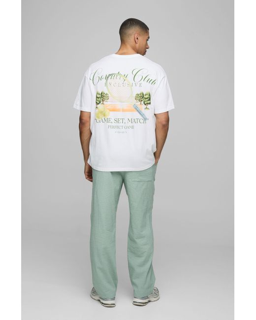 BoohooMAN Green Elasticated Relaxed Fit Plain Seersucker Trousers for men