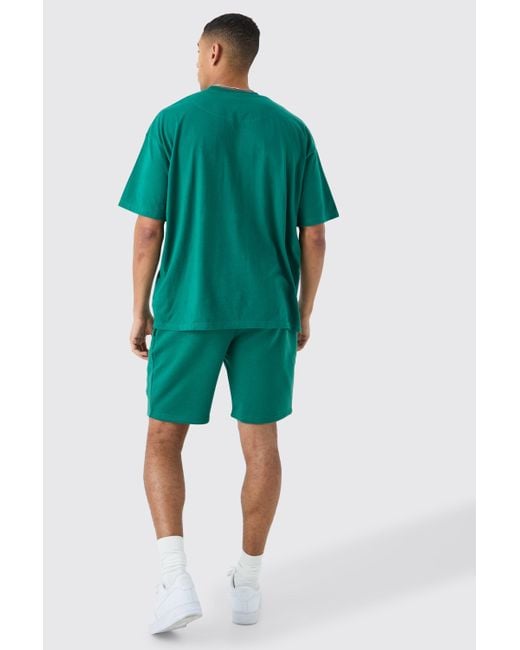 BoohooMAN Green Loose Mid Length Applique Shorts for men