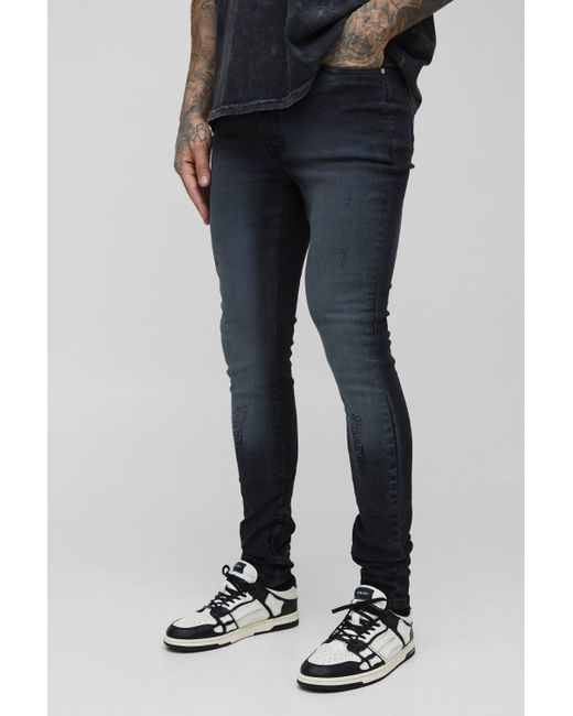 BoohooMAN Blue Tall Ripped Zip Hem Super Skinny Jeans for men