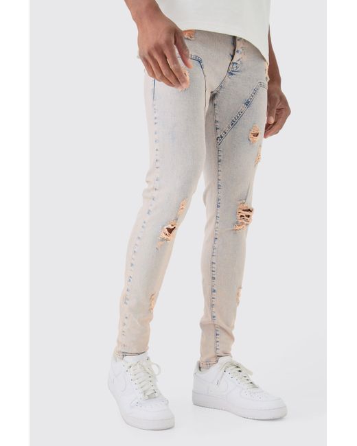 Boohoo Skinny Stretch Ripped Carpenter Jeans In Pink Tint