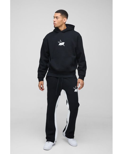 BoohooMAN Kastiger Oversize Trainingsanzug mit M Stern Print und Kapuze in Blue für Herren