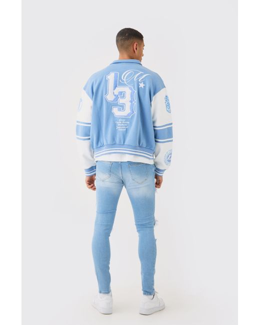 BoohooMAN Skinny Stretch All Over Rip Bleached Denim Jean In Light Blue for men