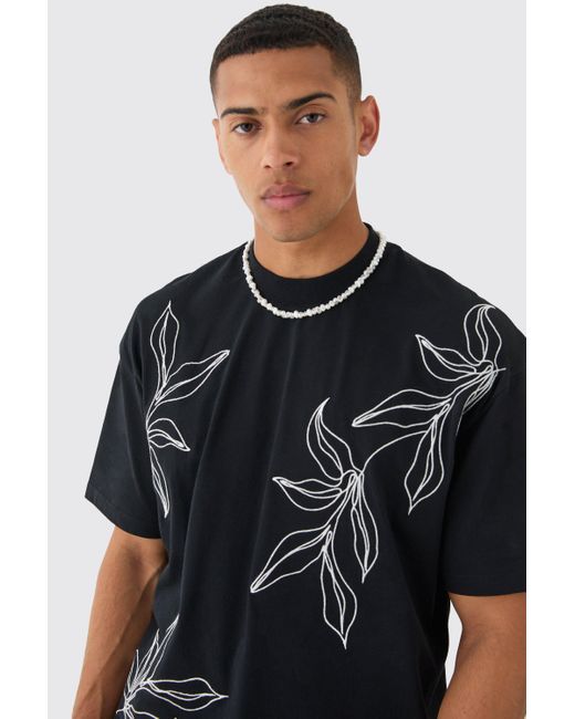 BoohooMAN Black Oversized Boxy Extended Neck Floral Line Embroidered T-shirt for men