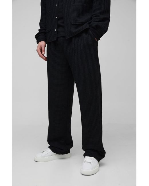 BoohooMAN Tall lockere gesteppte Hose mit elastischem Bund in Black für Herren