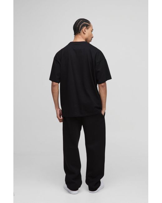 Camiseta Oversize Man Con Salpicaduras De Pintura Boohoo de color Black