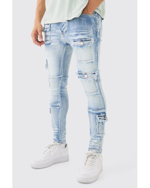 Boohoo Super Skinny Stretch Distressed Multi Pocket Jeans In Light Blue
