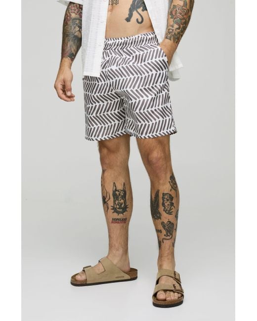 BoohooMAN Brown Pattern Printed Mid Length Swim Trunks for men