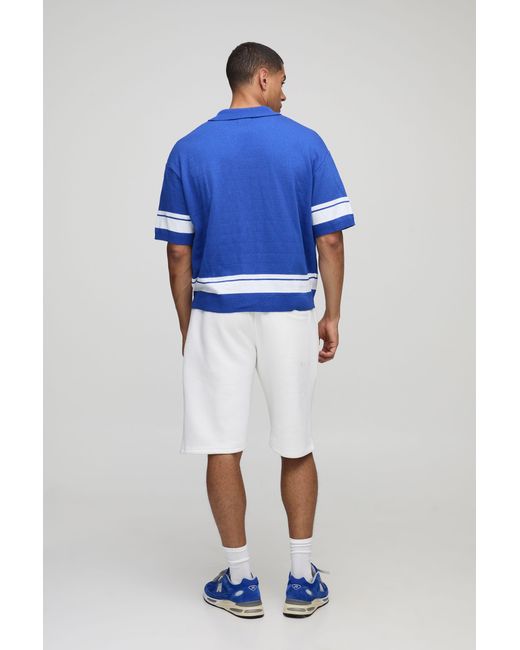 Oversized Racing Polo BoohooMAN Oversized Boxy Racing Moto Jacquard Knitted Polo in Blue for ...
