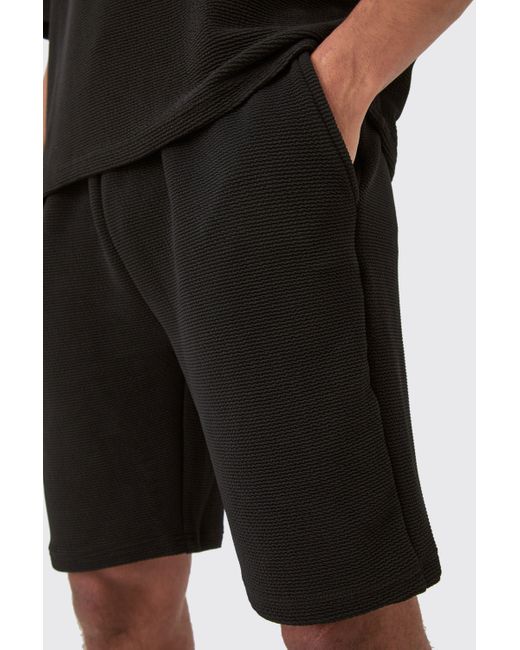 BoohooMAN Black Loose Fit Mid Length Textured Shorts for men