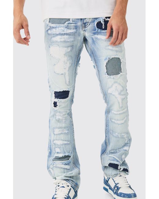 BoohooMAN Slim Rigid Flare Stacked Rip & Repair Jeans In Ice Blue for men