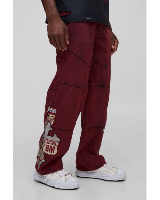BoohooMAN Men's Red Relaxed Moto Badge Cross Applique Paneled Jeans