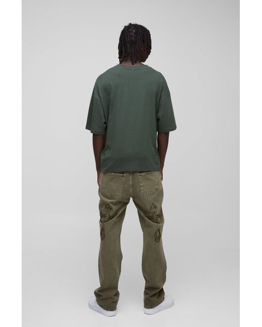 BoohooMAN Green Slim Flared Khaki Wash Cross Applique Gusset Jeans for men
