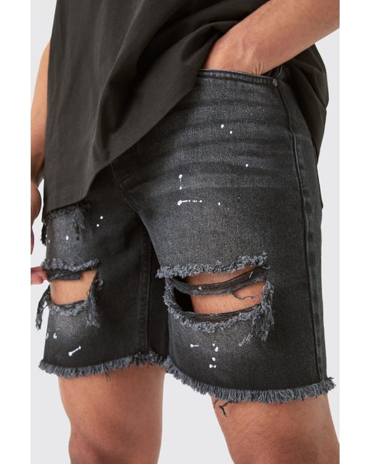 BoohooMAN Slim Rigid Ripped Paint Splatter Denim Shorts In Black for men