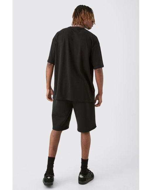 BoohooMAN Tall Metallic Puff Print Cross Graphic T-shirt In Black for men