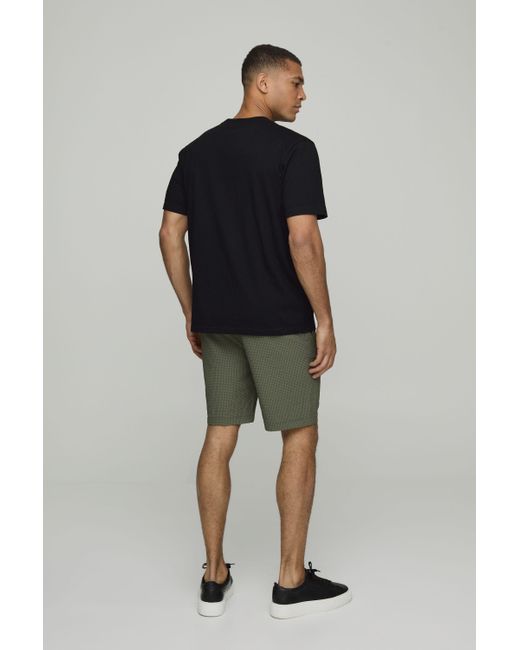 BoohooMAN Mittellange lockere Seersucker Shorts mit elastischem Bund in Green für Herren
